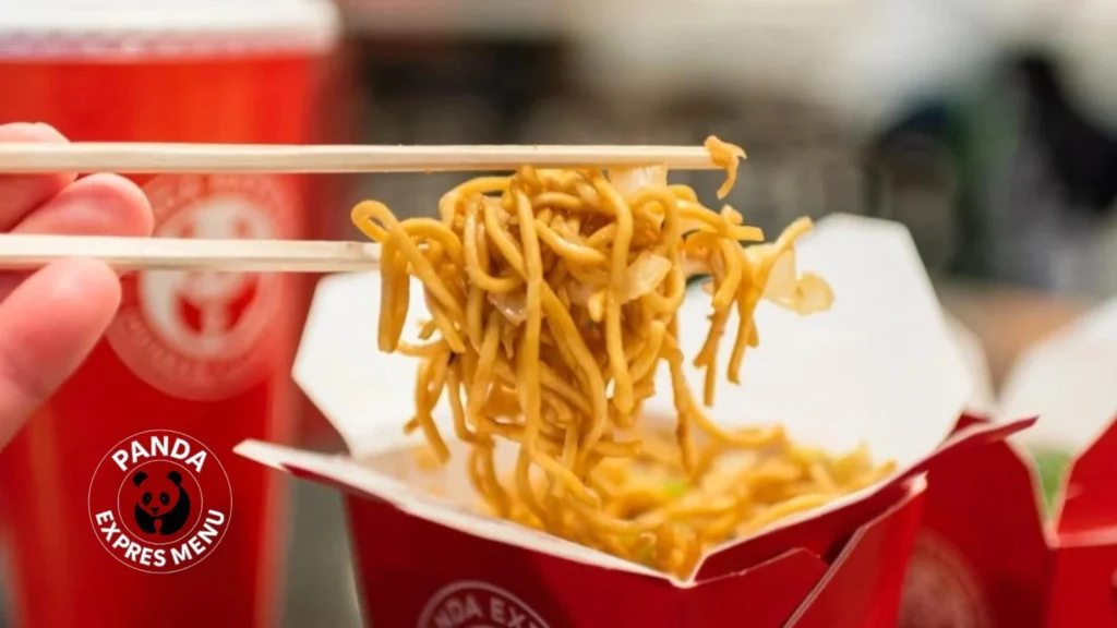 Panda Express Chow Mein 2 Close-up of Panda Express Chow Mein being picked up with chopsticks from takeout box
